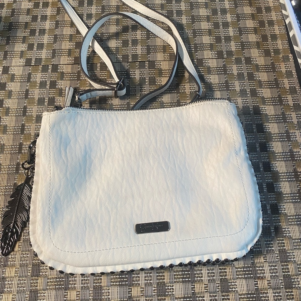 Jessica Simpson white over the shoulder bag with black details